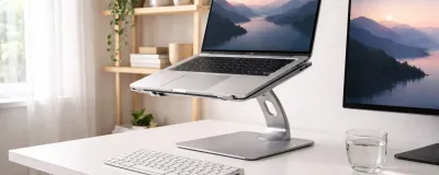 Collection of laptop stands at different heights on a desk