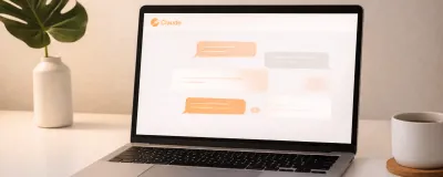 Claude AI interface on a laptop in a modern workspace