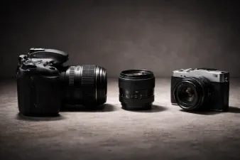 Side-by-side comparison of a DSLR and mirrorless camera