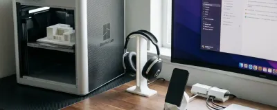 Ten functional 3D printed desk accessories arranged on a clean surface