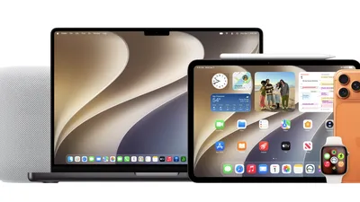 An iPhone and MacBook running the iOS 27 and macOS 27 developer beta home screens