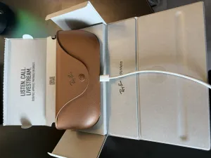 Ray-Ban Meta smart glasses on a desk in a modern setting