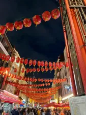 AI-planned London trip scene with Chinatown and city landmarks