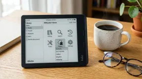 An e-reader device running KOReader displaying the plugins menu next to glasses and a coffee cup on a wooden desk.