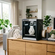 A sleek 3D printer integrated into a modern home interior, printing a beautiful vase.