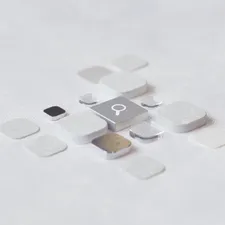 A glowing magnifying glass dissolving into digital data particles, representing the transition from traditional search to AI