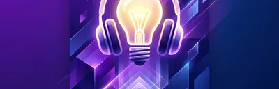 A sleek workstation with headphones and a glowing lightbulb icon, representing inspiration.