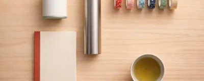 Collection of Japanese products including stationery, snacks, and electronics
