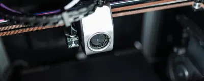 Common 3D printing mistakes illustrated with failed prints on a build plate