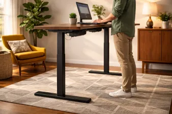 Collection of standing desks at different heights in a home office
