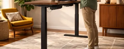 Collection of standing desks at different heights in a home office