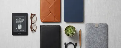 Selection of Kindle cases in different styles: origami stand, slim cover, leather wallet, and sleeve