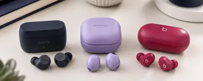 Several pairs of wireless earbuds under $100 with their charging cases