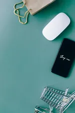 A person using a smartphone showing an AI assistant interface overlaid on a shopping app