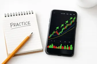 Collection of paper trading app interfaces on a phone and laptop