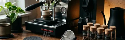 A high-end coffee station featuring 3D-printed WDT tools, puck screen holders, and bean cellars.