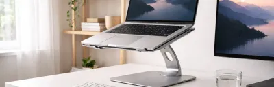 Collection of laptop stands at different heights on a desk
