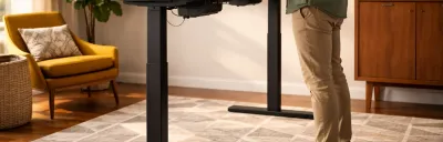 Collection of standing desks at different heights in a home office