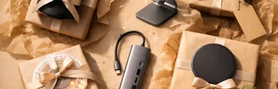 Collection of affordable tech gifts under 50 dollars on a clean background