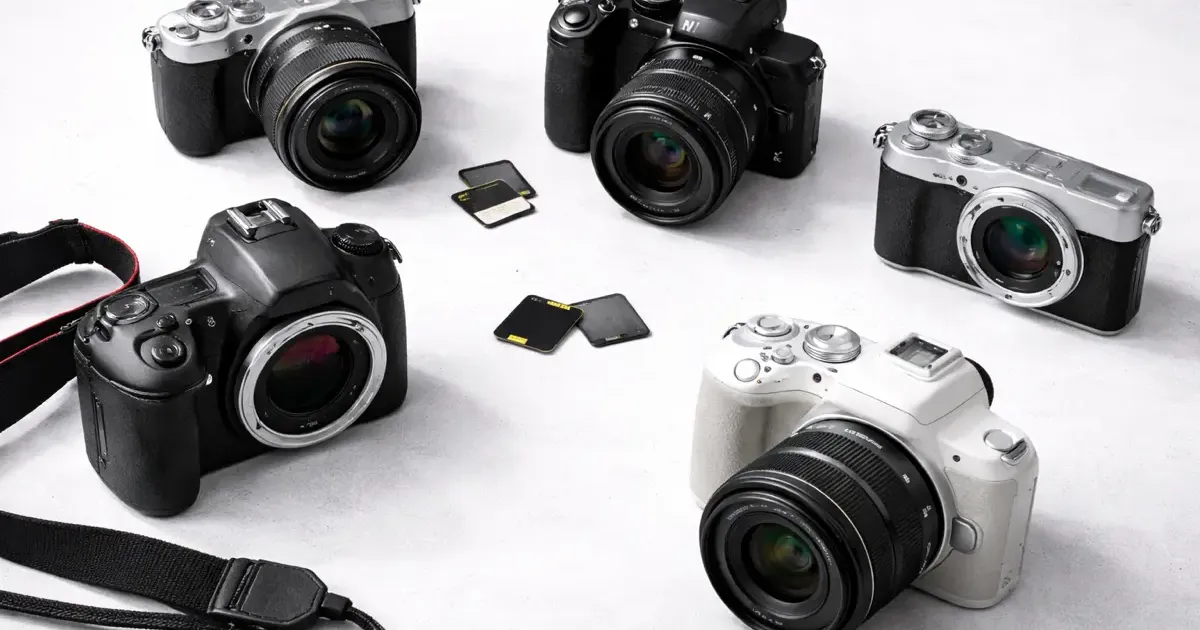 Collection of budget cameras under 500 dollars on a clean background