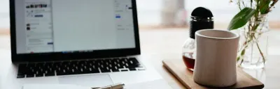 Coursera AI course logos from Google, Stanford, and IBM on a minimal background