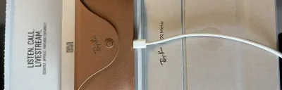 Ray-Ban Meta smart glasses on a desk in a modern setting