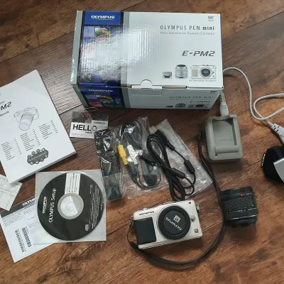 The Tiny Powerhouse: Is the Olympus PEN Lite E-PM2 the Perfect 'Work-Boredom' Camera?